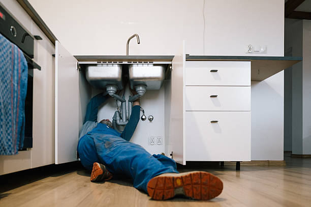 Professional Drain Cleaning technician working in Oak Creek, WI